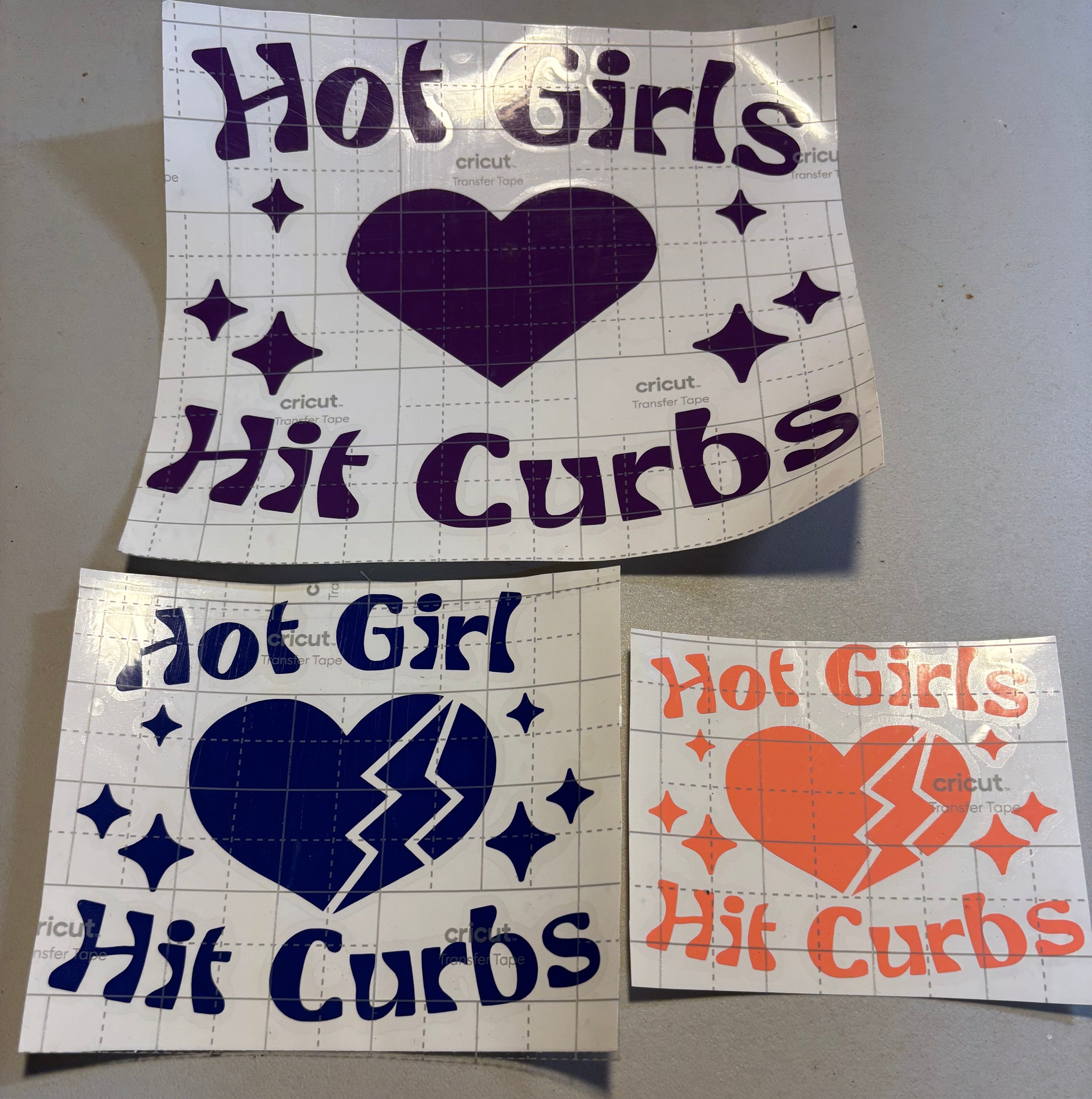 Hot Girls Hit Curbs vinyl decal bundle in purple, navy, and orange